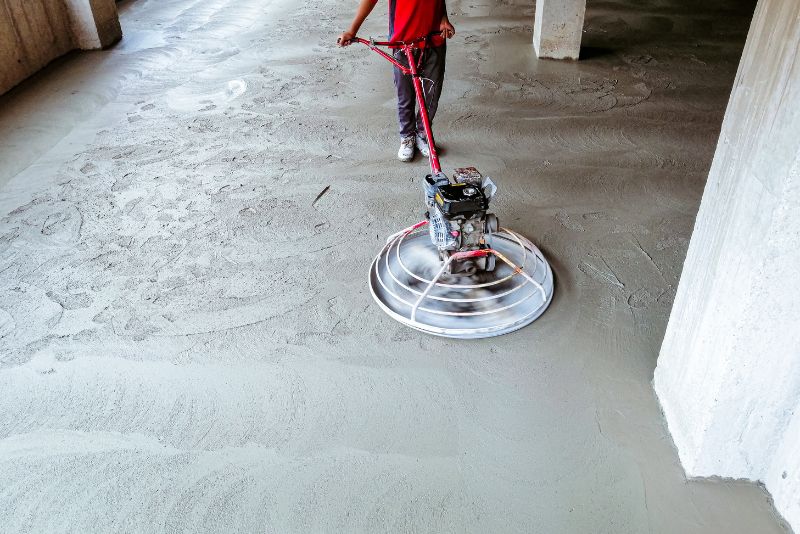 concrete floor being polished for finishing