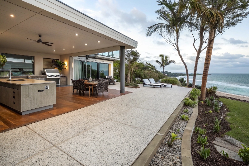 Decorative concrete patio entertainment area Walkers Point QLD coastal home outdoor living