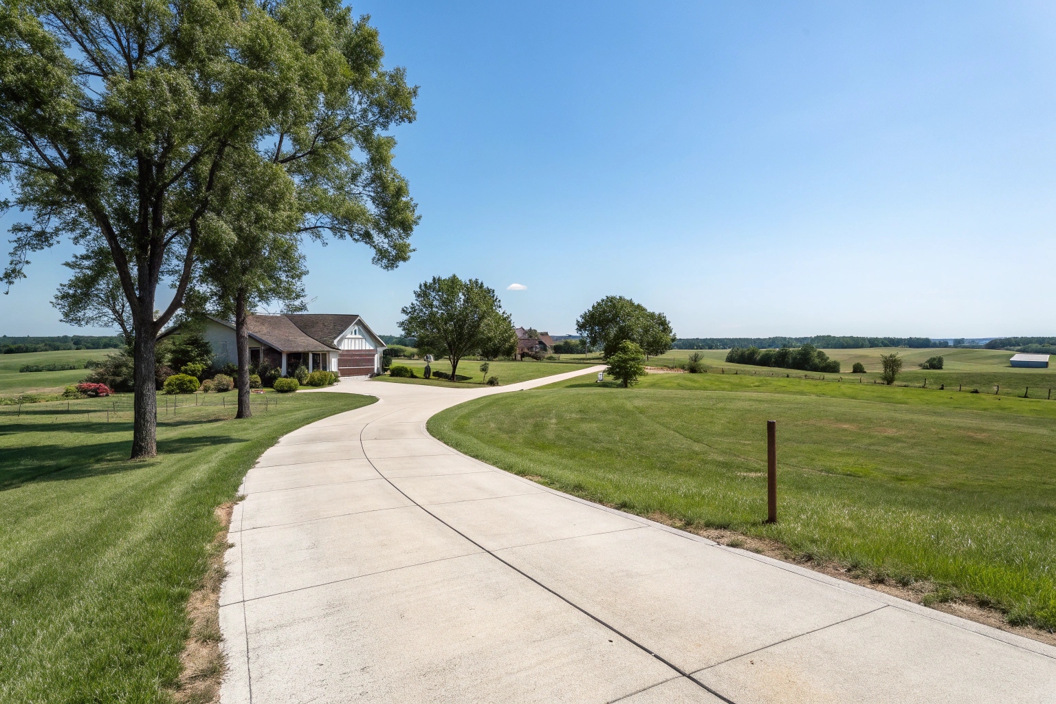 Long concrete driveway on acreage property in Nikenbah Queensland