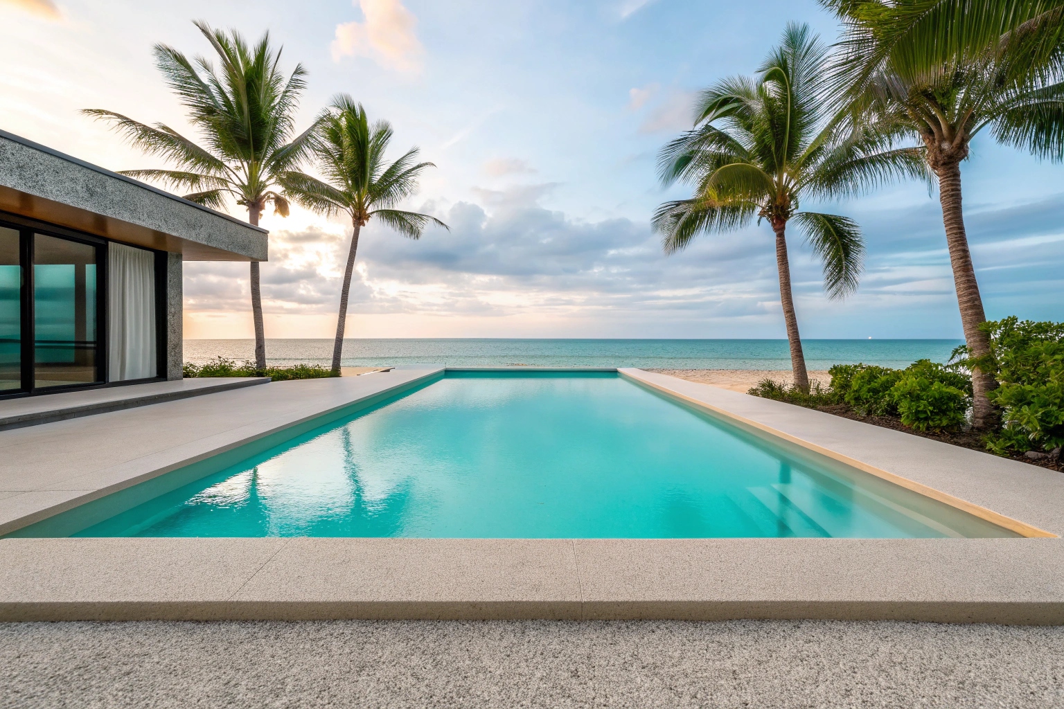 Exposed aggregate pool surround decorative concrete Point Vernon